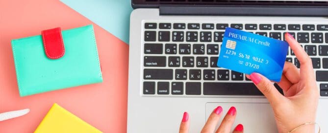 Woman securely entering credit card on online website