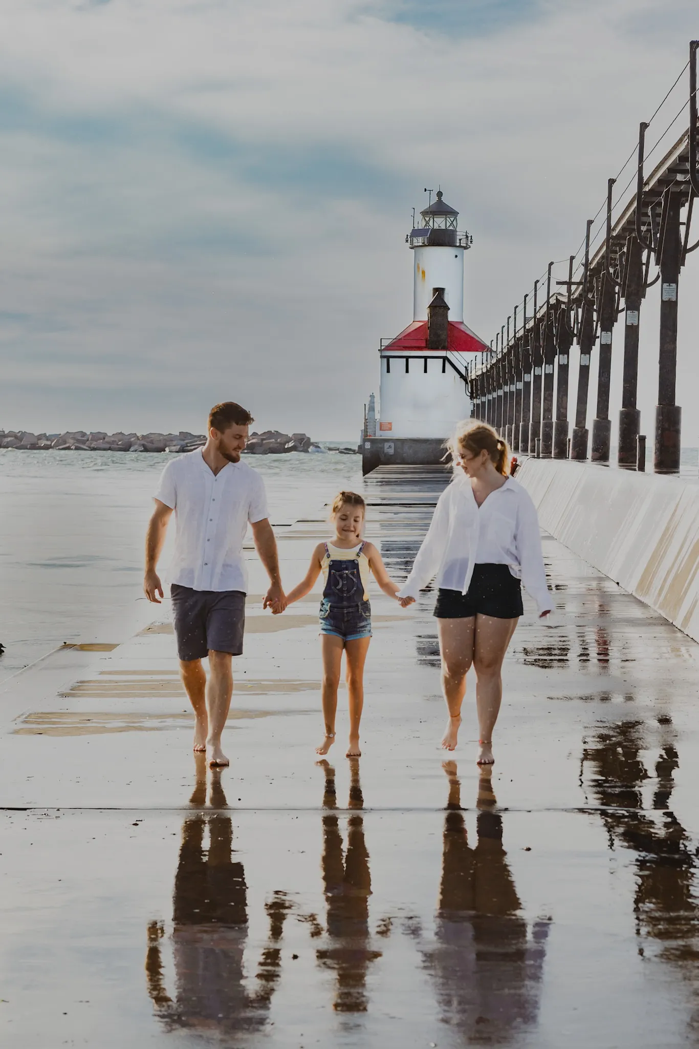 Family walking on pier in Michigan City, Indiana