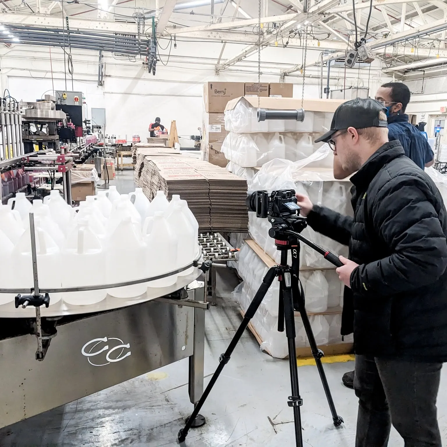 484961540_2818271915047460_3403565095172570790_n Sera Group videographer filming on a manufacturing production line for a client video
