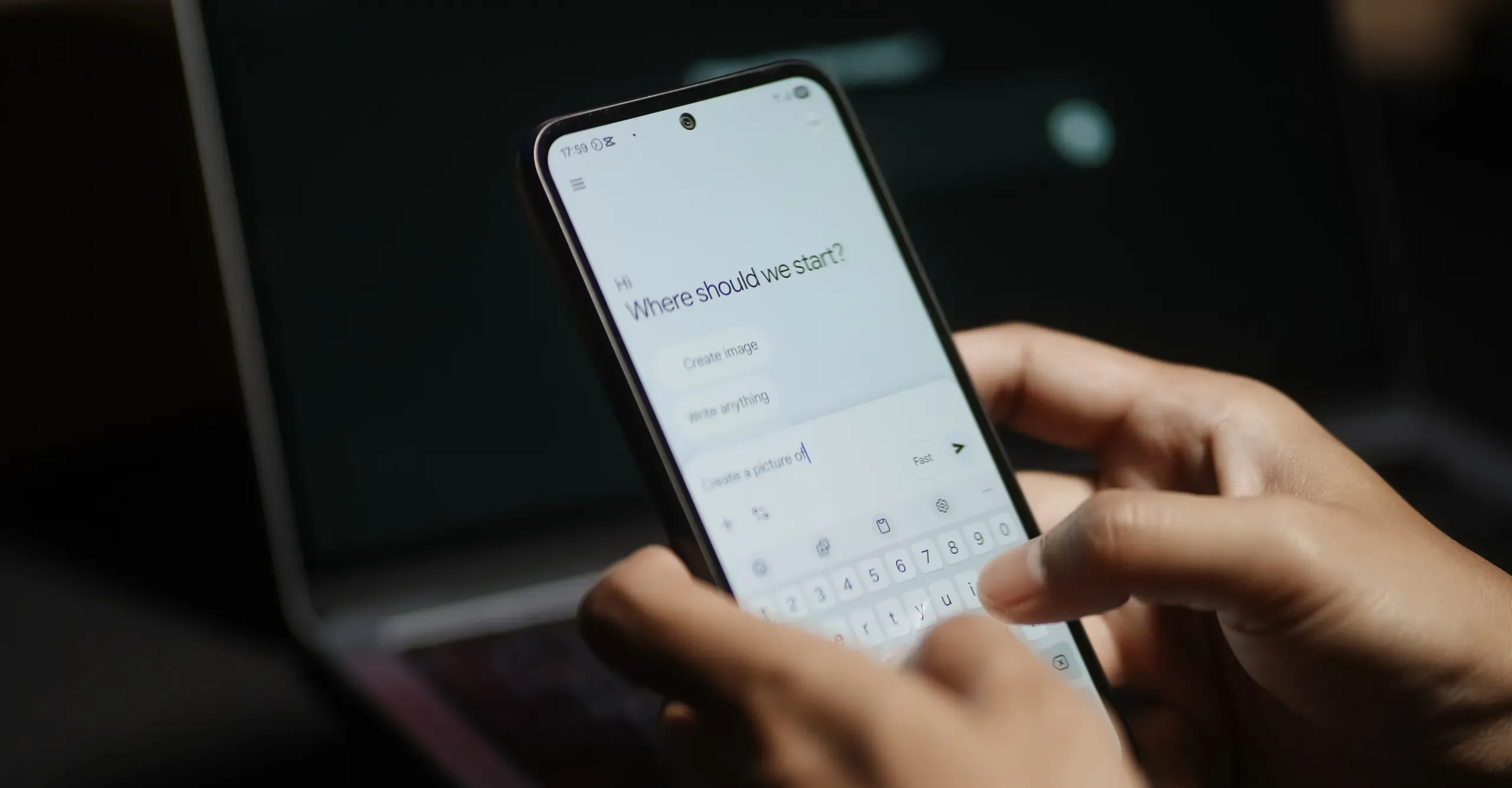The hands of a man using a laptop or smartphone to operate artificial intelligence (AI), inputting commands and interacting with AI, AI assistants, chatbots, chatGPT.